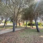 Climatise Avec Terrasse Coucher De Soleil Menage Compris Pour 2 A 3 Personnes Dans Un Parc Calme Avec Double Piscine Au Sel Et Parking Prive Protege Proche Et Port * Saint-Florent (Corsica)